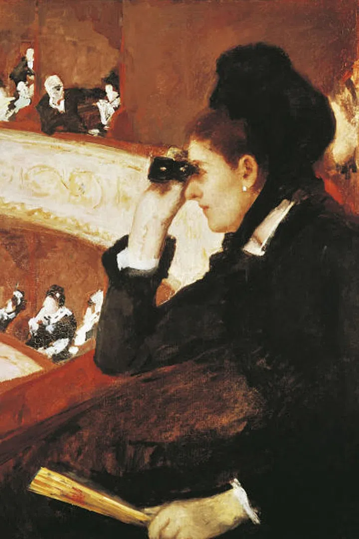One of three female artists and the only American officially associated with Impressionism, Mary Cassatt was also an invaluable advisor, helping introduce European art to major collectors in the United States. Cassatt strongly believed that painting needed to reflect modern life. Her modern woman is expertly rendered in the 1878 painting In the Loge, the first Impressionist work the artist exhibited in the United States. Many male artists had depicted women in theater boxes as objects of display, but Cassatt's female protagonist plays a dynamic role engaged in the act of looking. Nonetheless, the male gaze prevails as in the distance a grey-haired theatergoer stares directly at her with his own binoculars. As viewer and onlooker, we complete the circle.
Pictured: In the Loge, 1878, MFA Boston
