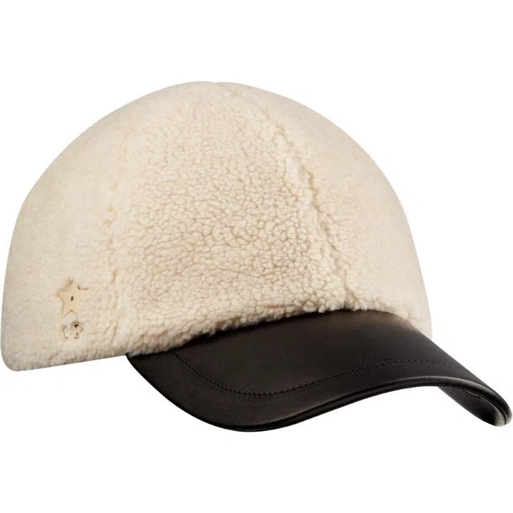 Christmas gift guide 2024 travel fashion Dior cream black shearling leather cap