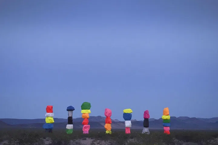  Seven Magic Mountains

Twenty-five minutes from center-city Las Vegas sits Seven Magic Mountains, Ugo Rondinone's tower stacks of neon stones. The exhibition will be open through spring of 2018, so start planning your trip now. Photo: Getty