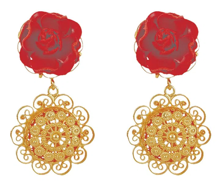 Earrings, about $887, Dolce&Gabbana at Club 21 Online 