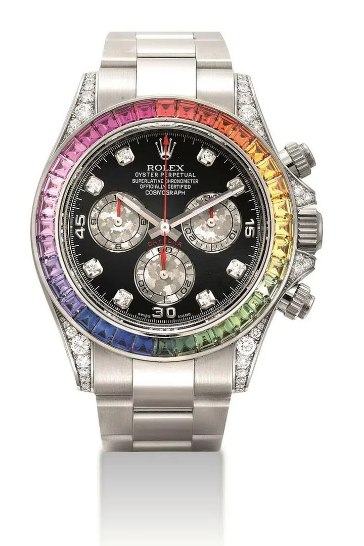 Rolex Cosmograph Daytona with 18k white gold and diamond-set automatic chronograph wristwatch with bracelet and rainbow-coloured multi-gem set bezel circa 2012. Photo: Courtesy of Christie's