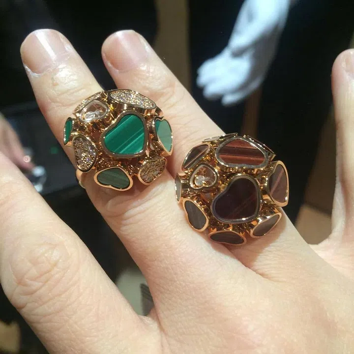 Sculptural Happy Hearts rings with tiger's eye and malachite