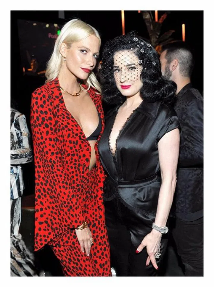 Clad in Roberto Cavalli, the recently turned actress took the opportunity to catch up with Von Teese