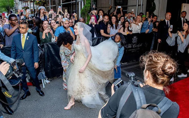 Even Virgin Mary needs help getting around, especially in that stunning Oscar De La Renta. Photo: Getty 