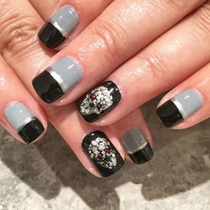 Francis Liang (@purplenailbox) painted ghoulish faces with the silvery Tenoverten Rockstar, then accented other nails with the cool gray Tenoverten Essex. 