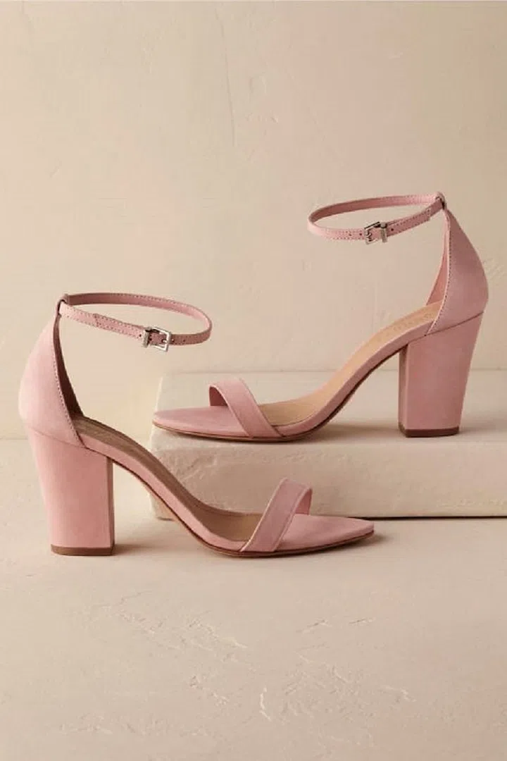 Instead of "something blue" why not try adding "something pink" to your wedding ensemble? BHLDN Alicia Heels, $170 