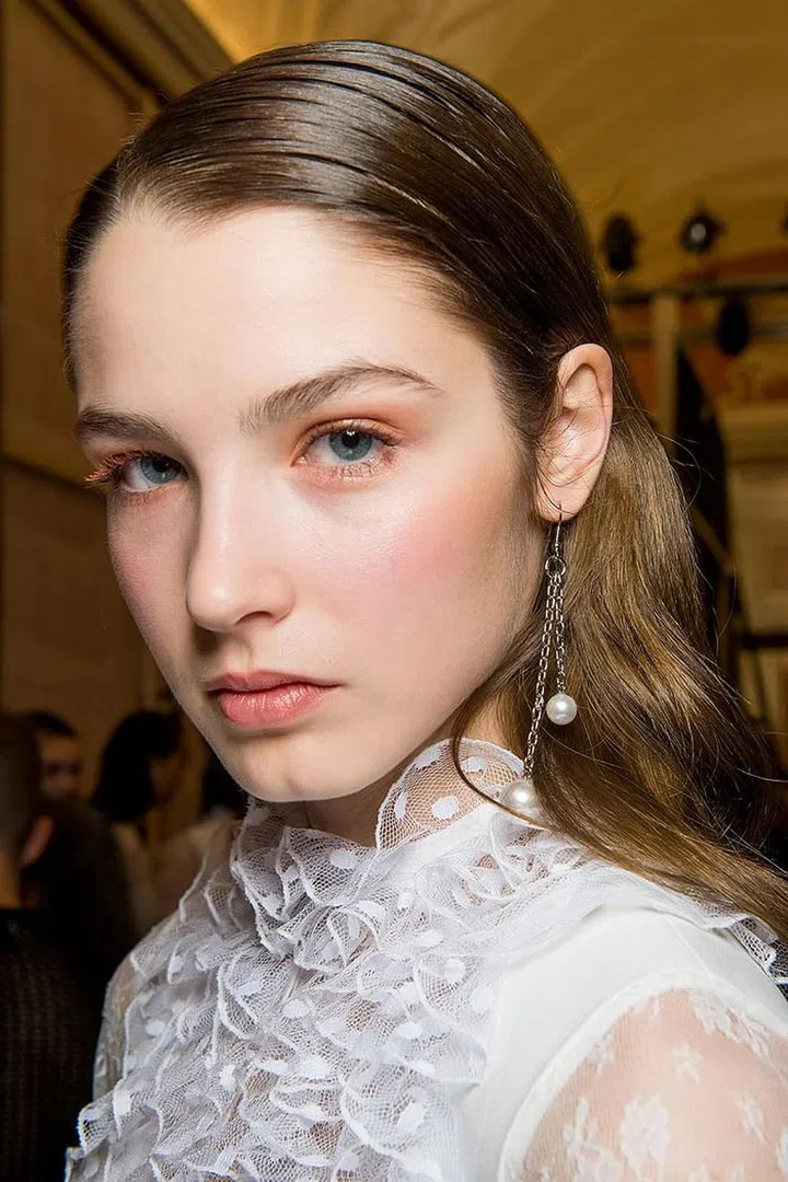 At Blugirl, like Brandon Maxwell, hair was slicked-down only to the ears and then tucked, leaving the rest of the length to be its textured, fuzzy, self. 