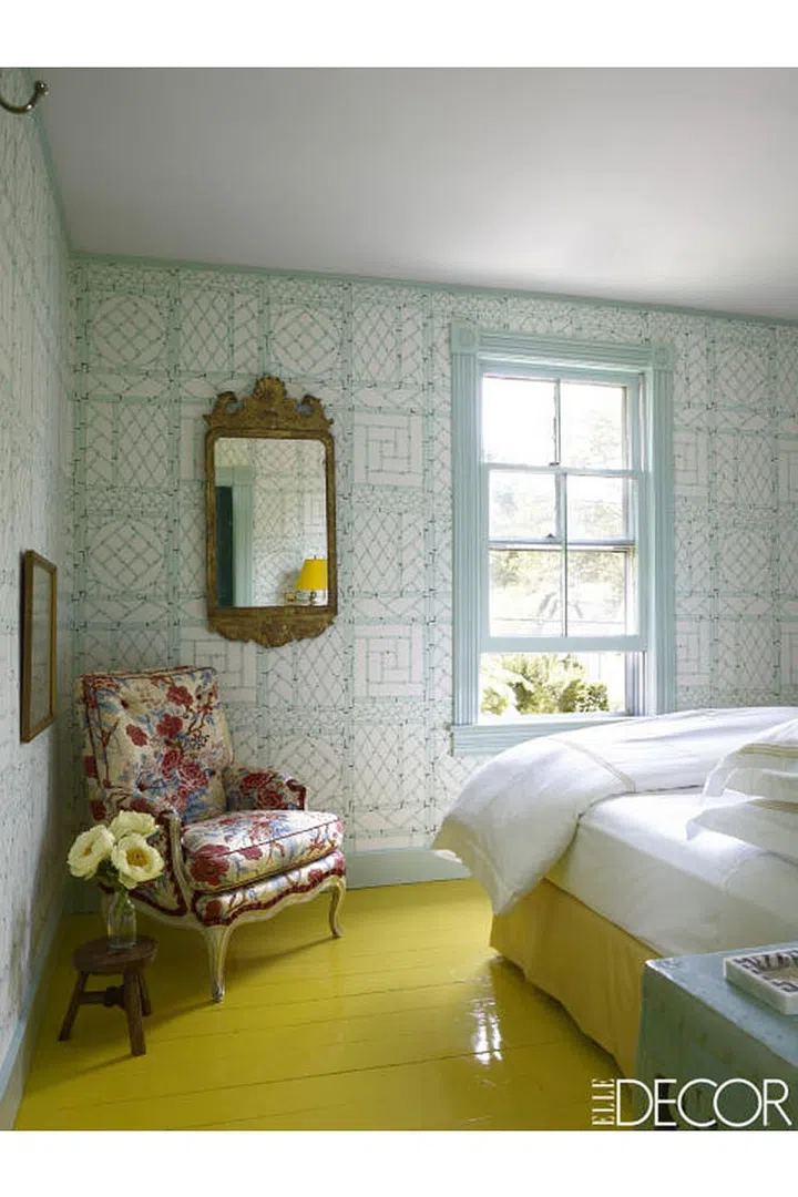 Yes, painting your floor lemon yellow is a risk – but don't you feel happier just looking at this room? Similar to shown: Fiesta Yellow by Benjamin Moore. Photo: William Waldron 