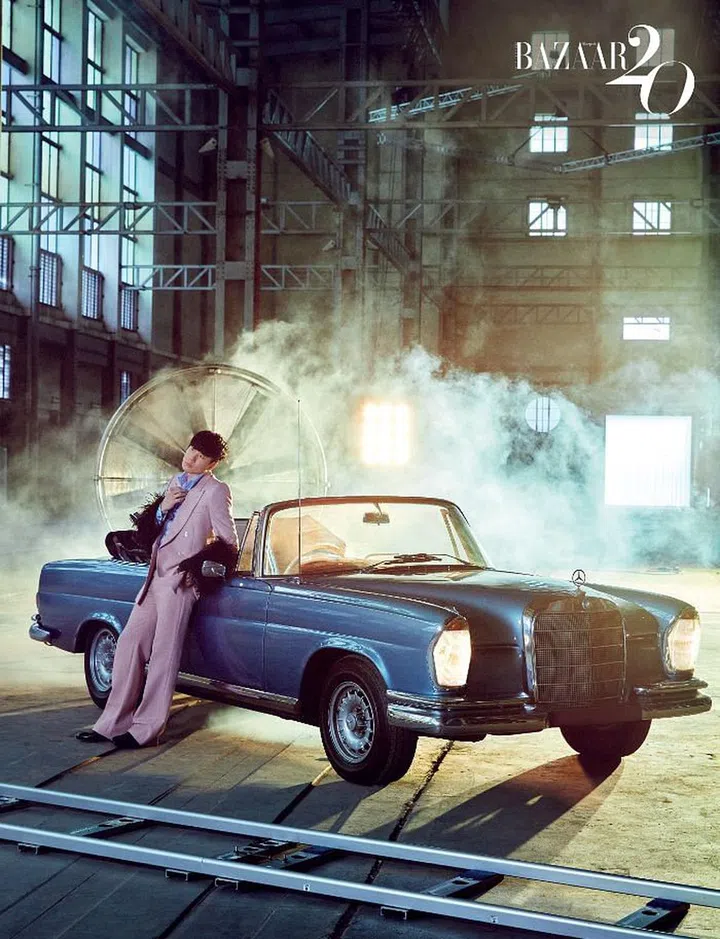 Wool and feather jacket; matching trousers; cotton shirt; leather shoes, Gucci.