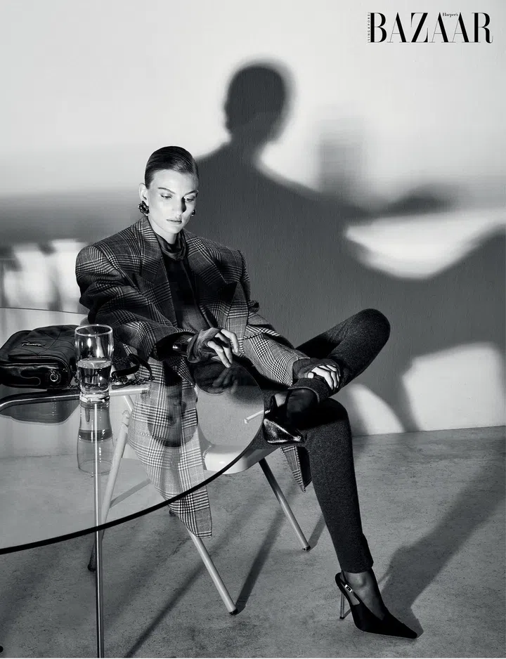 Jacket; blouse; leggings; earrings; cuff; bag (on the table); slingback heels, Saint Laurent by Anthony Vaccarello