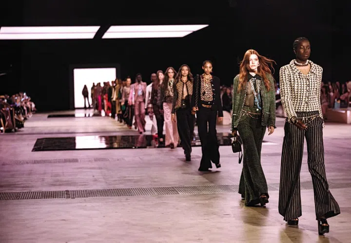 The finale at the Chanel Métiers d’art show in Tokyo Big Sight. Models donned Seventies -inspired looks that featured intricate embroidery and detailing crafted by the House’s various Maisons d’art