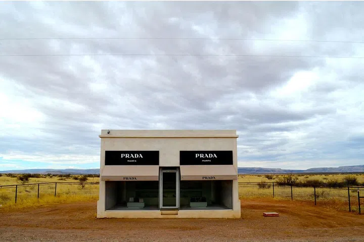 26 miles northwest of Marfa, Texas, sits a time capsule of mid-aughts luxury fashion. Elmgreen and Dragset's Prada Marfa was built to deteriorate and "become one" with the surrounding land, but that idea was abandoned when it was vandalized six days after completion. After visiting, head to Donald Judd's Chinanti Foundation, a 35-minute drive down Highway 90. Photo: Getty