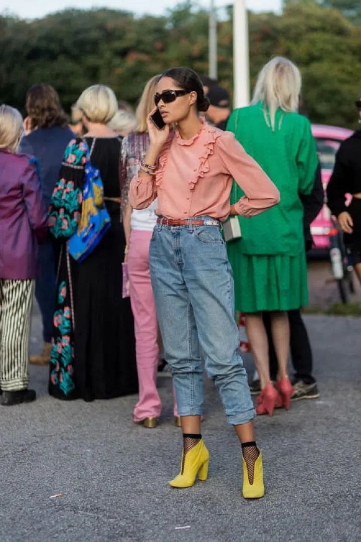Invest in bright accessories. Photo: Getty 