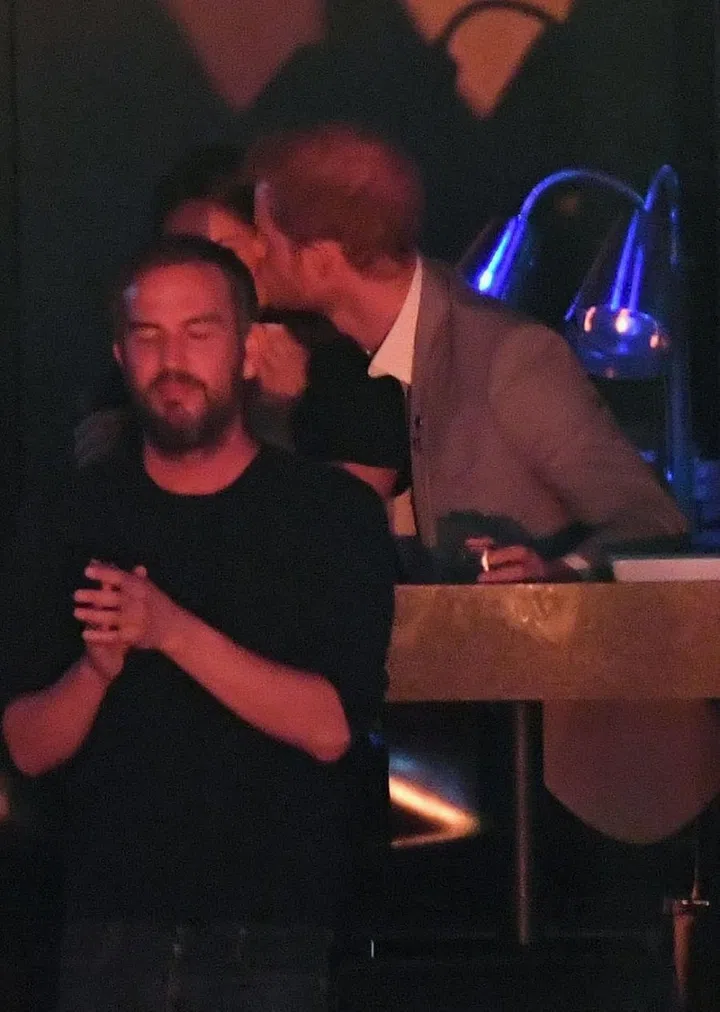 In a rarely seen moment of royal PDA, Prince Harry planted a kiss on his girlfriend's cheek.