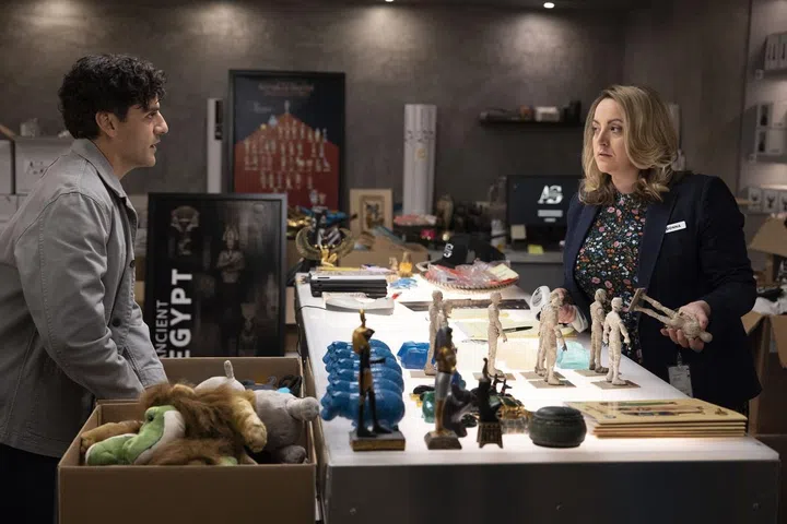 Oscar Isaac as Marc Spector/Steven Grant and Lucy Thackeray as Donna in Marvel Studios' Moon Knight. Photo by Matt Kennedy. 