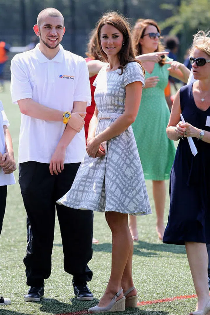 Along with her shorter hemlines, the Queen rung the death knell for Kate's ubiquitous wedges, her shoe of choice for many casual public appearances. Photo: Getty