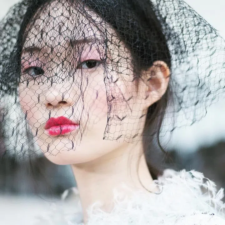 The models were wearing a bright, glossy-pink lip at the Chanel Couture show. Inspired by traditional French gardens, the lip added a modern touch to the otherwise feminine and delicate looks.