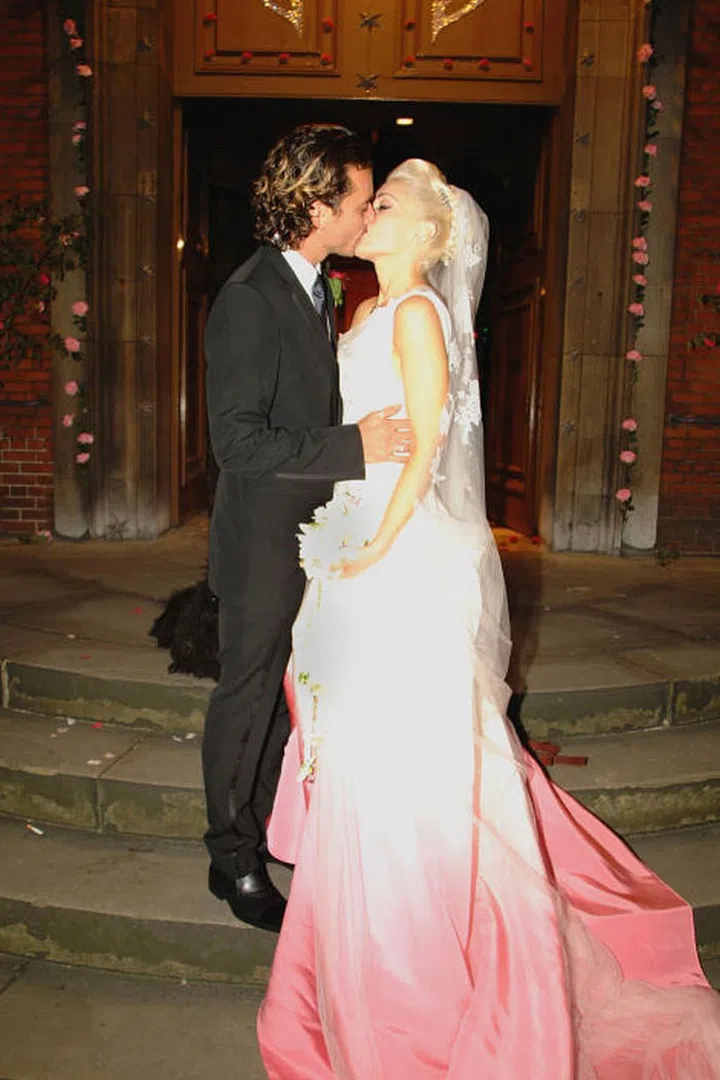 In a move that only a true rockstar could pull off, No Doubt singer Gwen Stefani married Bush singer Gavin Rossdale while wearing a wild Christian Dior dress designed by John Galliano that featured a striking white-to-pink gradient and a lengthy train.