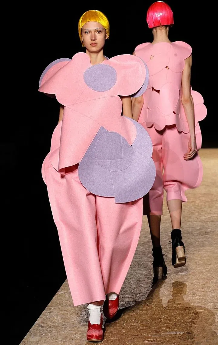 Autumn/winter 2012 saw a celebration of two-dimensional looks – a love of all things flat, complete with cropped, colourful wigs and wooden shoes. Photo: Getty