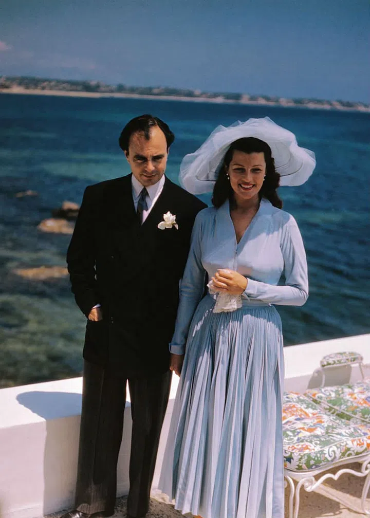 Notorious playboy Aly Khan, a son of Sultan Muhammed Shah, Aga Khan III arranged his own meet cute with Hollywood royalty Rita Hayworth, via gossip columnist Elsa Maxwell, who arranged a dinner party on the French riviera for the sole purpose of their meeting. At the time, having just announced her separation from actor-director Orson Welles, Hayworth was being pursued by Aristotle Onassis and the Shah of Iran.

Grace Kelly and Prince Rainer of MonacoThe two didn't separate from one another all night, but didn't marry until 1949–Aly's playboy behavior, Rita's on-again-off-again marriage to Welles, their both being pursued by countless other men and women and the distance between them got in the way.Photo: Getty