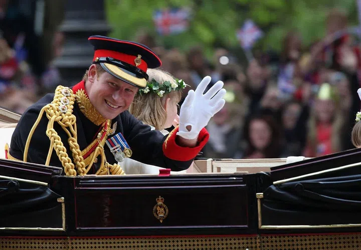Prince Harry, 26, in procession to Buckingham Palace from Westminster Abbey where his brother, Prince William's, Royal Wedding was held.