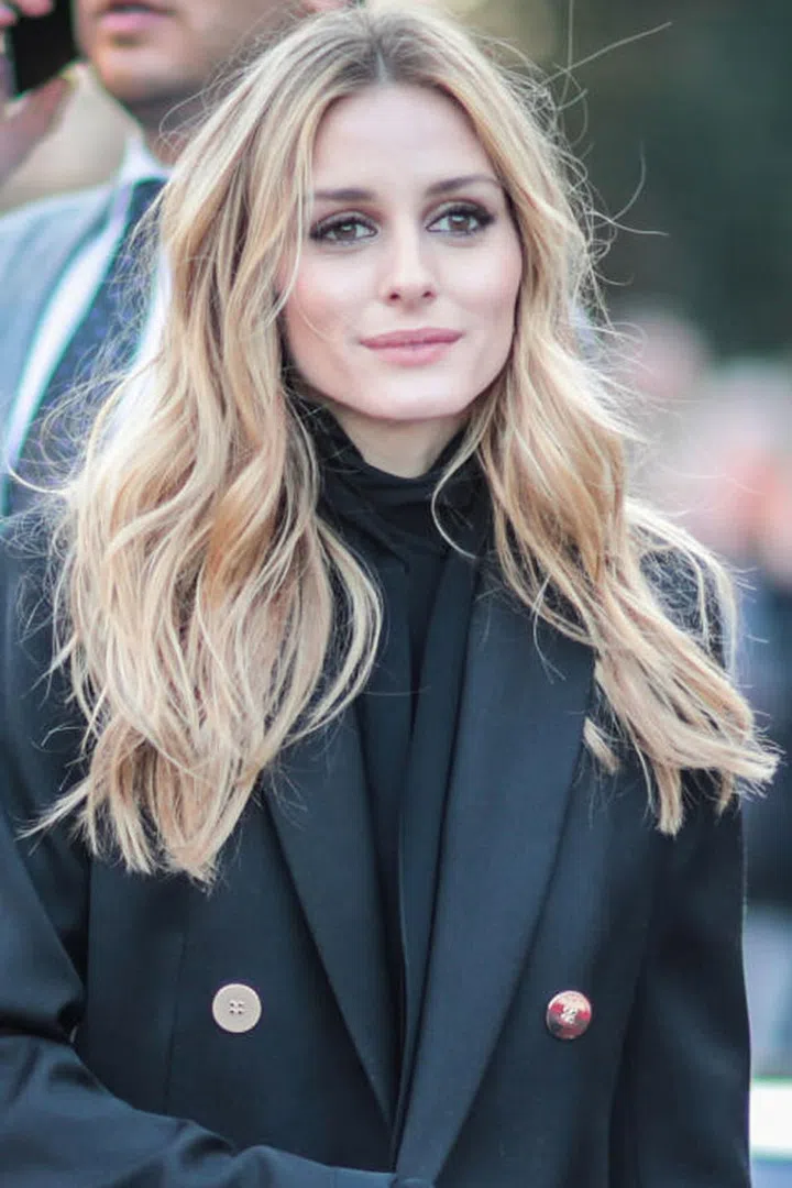 Street style star Olivia Palermo's slept-in strands are always photo-ready thanks to smooth roots and straight ends. Photo: Getty