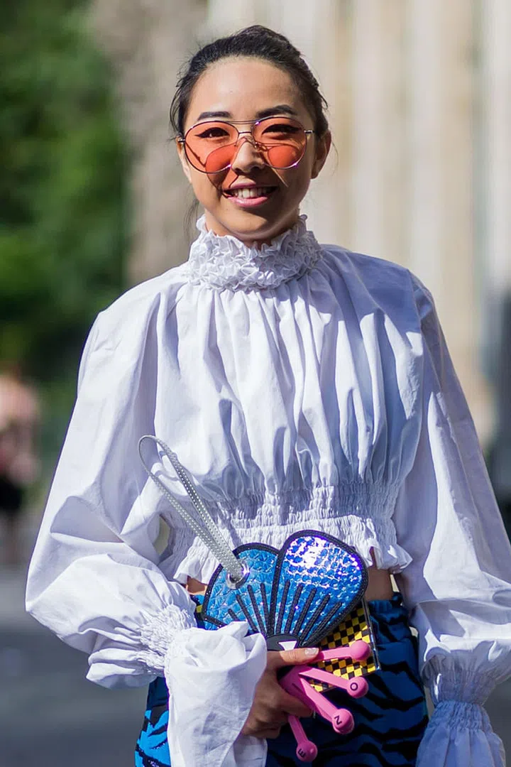 Alternatively, the specs also make a nice contrast if paired with a romantic blouse. Photo: Getty 