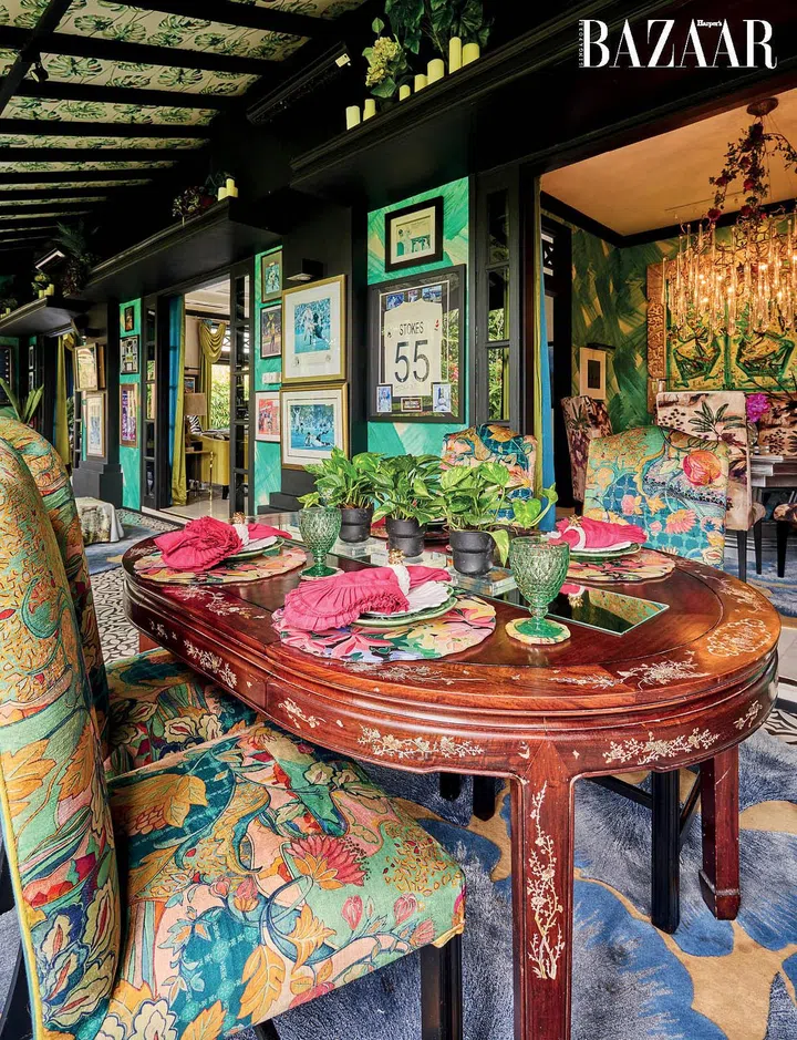 An antique rosewood table with mother-of-pearl inlay in one of the informal dining spots
in the house. Photo: Lawrence Teo