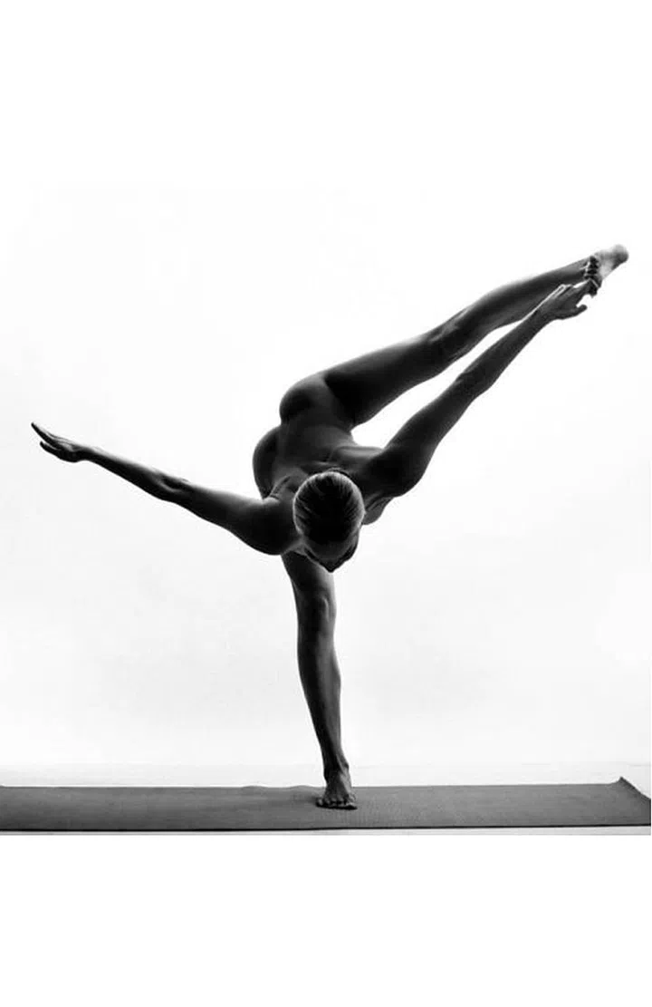  This anonymous, sophisticated yogi challenges everything you know about fitness (and nudity) on Instagram. Follow her for a stunning new pose in black and white each day. Photo: Instagram
