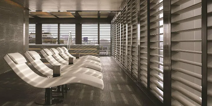 Ergonomic reclining chairs at the relaxation lounge at Armani Hotel Milano