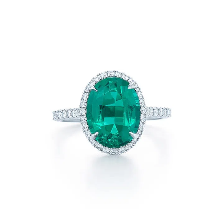 Oval shape emerald ring with diamonds set in platinum, Price upon request, Kwiat.com.
