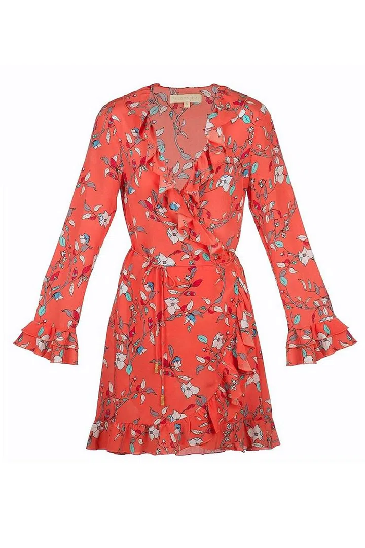 Flattering and feminine, Paloma Blue's coral ruffle dress works well with simple sandals as well as white pumps.