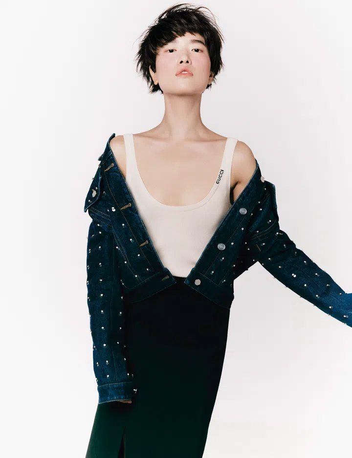 Jacket; top; skirt, Gucci. 