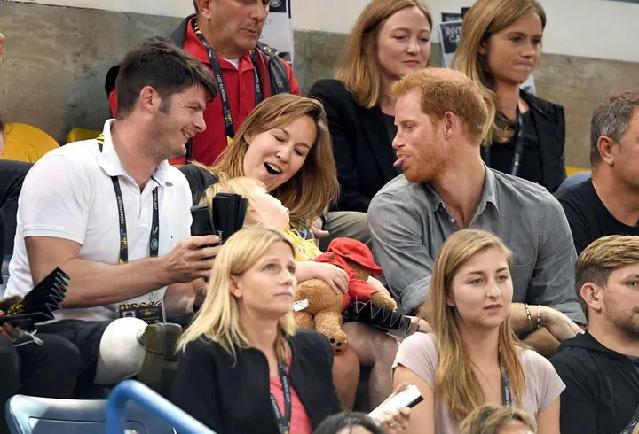 The Prince goofs around with the young daughter of an Invictus Games athlete.