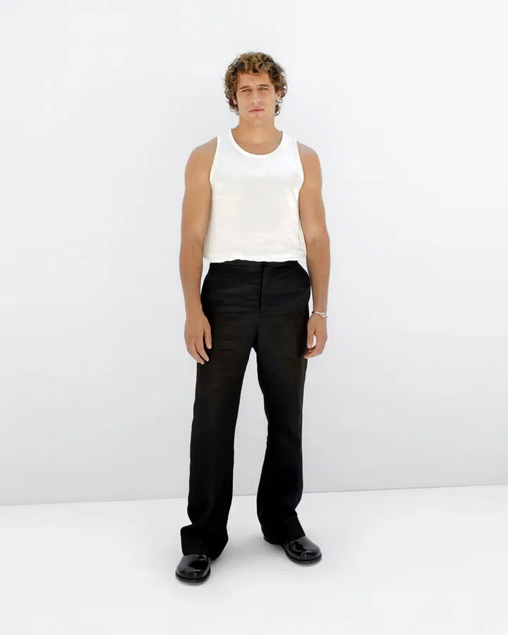 Martino Rivas in a white LOEWE tank top