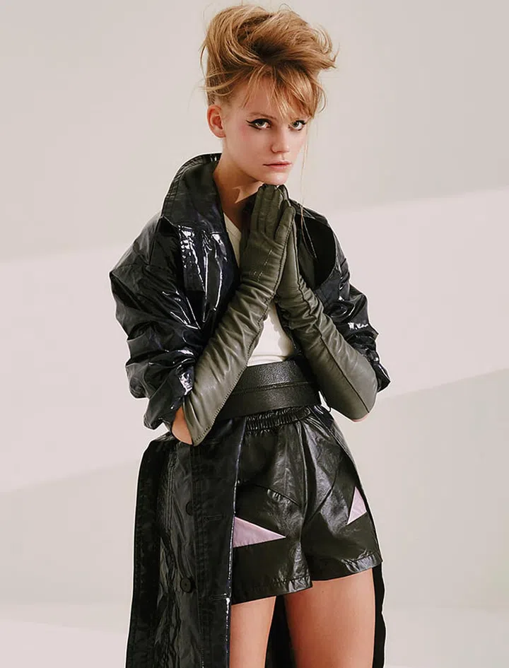 Nylon parka, Kate Spade New York. Nylon shorts, Puma. Cotton top, H&M. Leather belt, Brunello Cucinelli. Gloves, stylist’s own