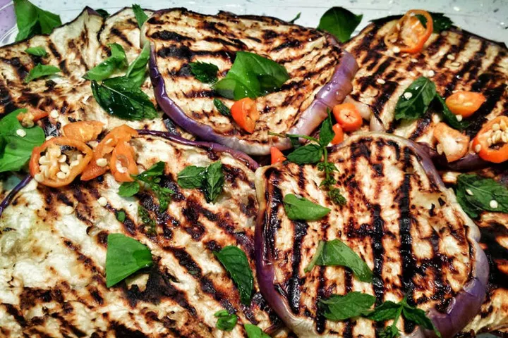 Crowd your BBQ plate with grilled veggies — they're lower in calories and fat, and higher in fiber than the second cheeseburger you'd be craving had you not filled up on eggplant, sweet peppers, and onions.