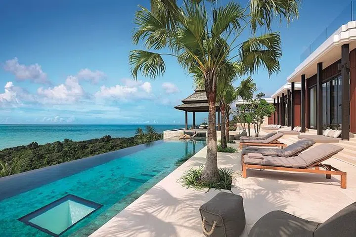 Take in the grand views of Phuket's turquoise waters set against the long inﬁ nity pool that runs down the length of the villa. Photo: Layan Residences by Anantara