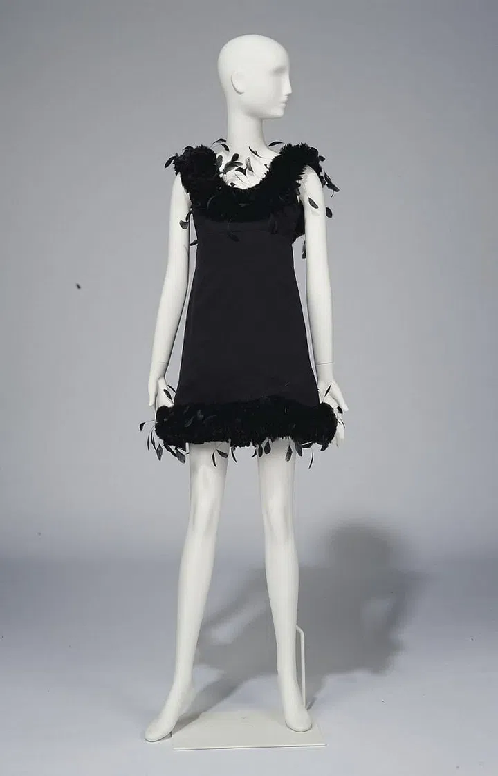 A black satin cocktail gown adorned with feathers by Givenchy Couture. Photo: Christie's