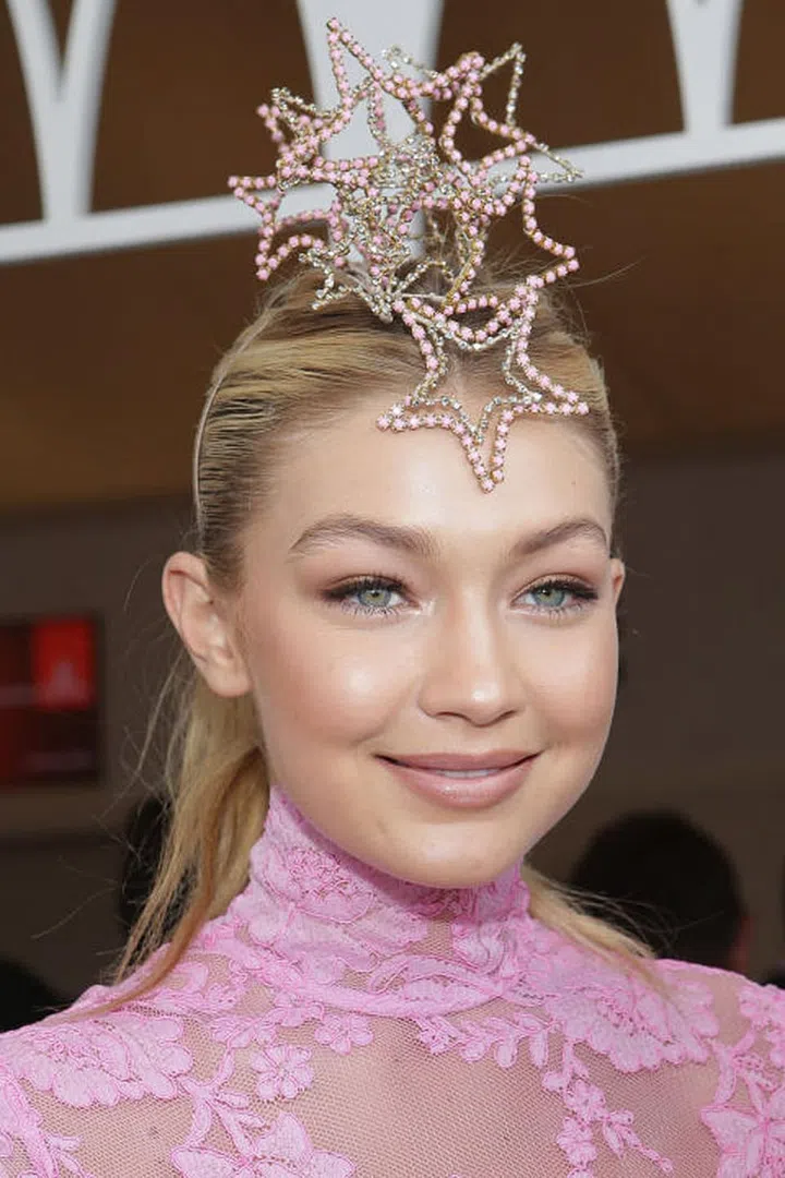 Is it crazy? Yes. But we love a crazy accessory, especially when the occasion calls for it. Hadid wore hers to the Emirates Marquee on Melbourne Cup Day race in 2014. Photo: Getty