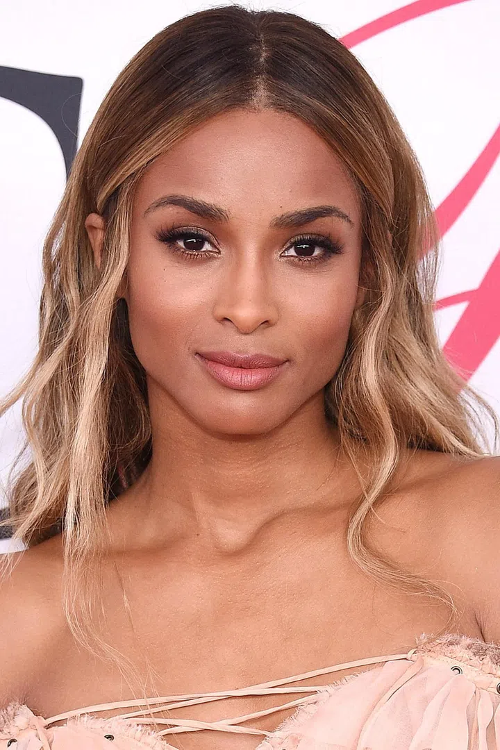 Ciara's soft bends in the hair and earthy makeup tones make for a romantic summer beauty look.
