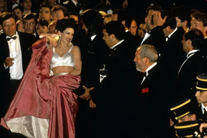 Remember when Madonna paired her signature bra top with a duvet cover of a coat? So good.Photo: Getty