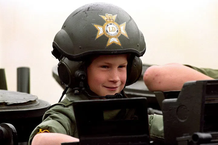 Prince Harry, 9, visits the barracks of the light dragoons in Hanover, Germany.