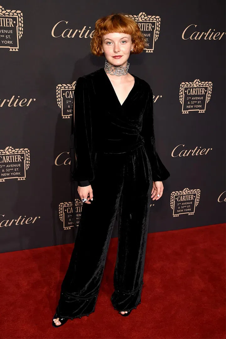 Kacy Hill looks sleek in the velvet black jumpsuit, finishing it with a jeweled choker. Photo: Getty