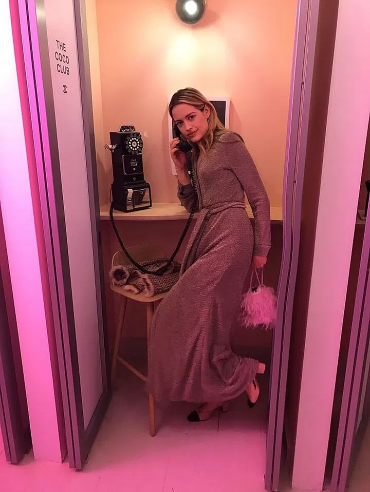 T&C's Sarah Bray in the phone booth room at the Coco Club. Photo: Chanel