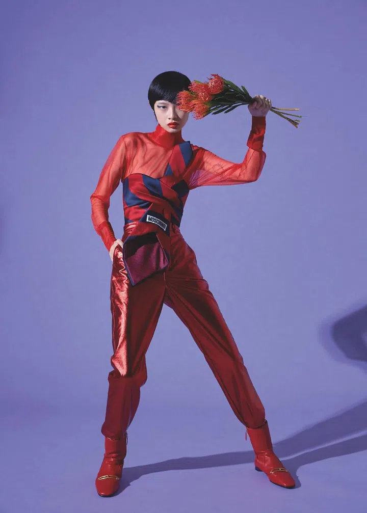 Bustier top, Moschino. Top; trousers, Dolce&Gabbana. Boots, Hermès (Photo: Vee Chin)