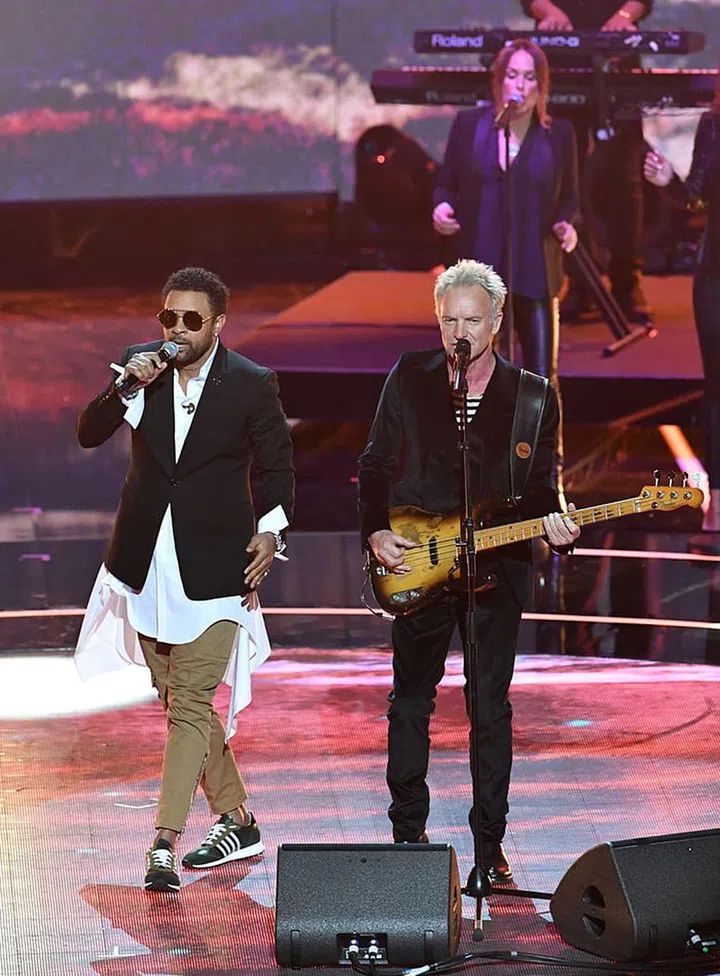 Sting and Shaggy performing together for the Queen's birthday celebration.