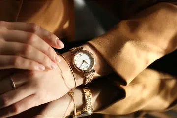 woman wearing luxury watch