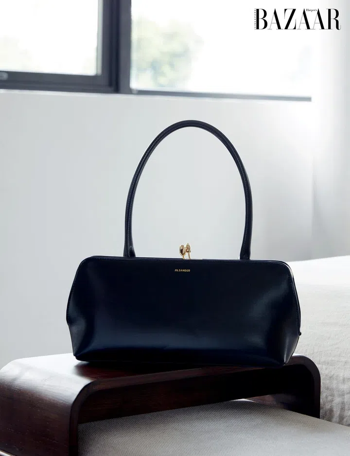 Her Jil Sander bag epitomises her minimalist style. Photo: Gan