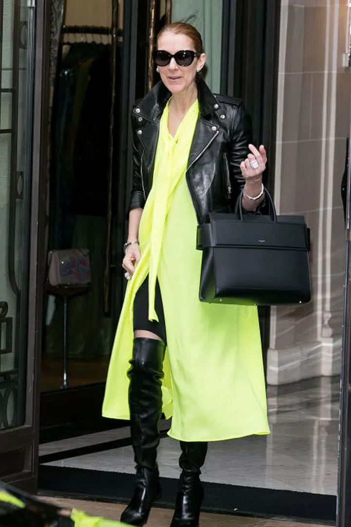 In a Balenciaga dress, Saint Laurent leather jacket, Le Silla boots, and a Givenchy tote in Paris, France.
Photo: Getty